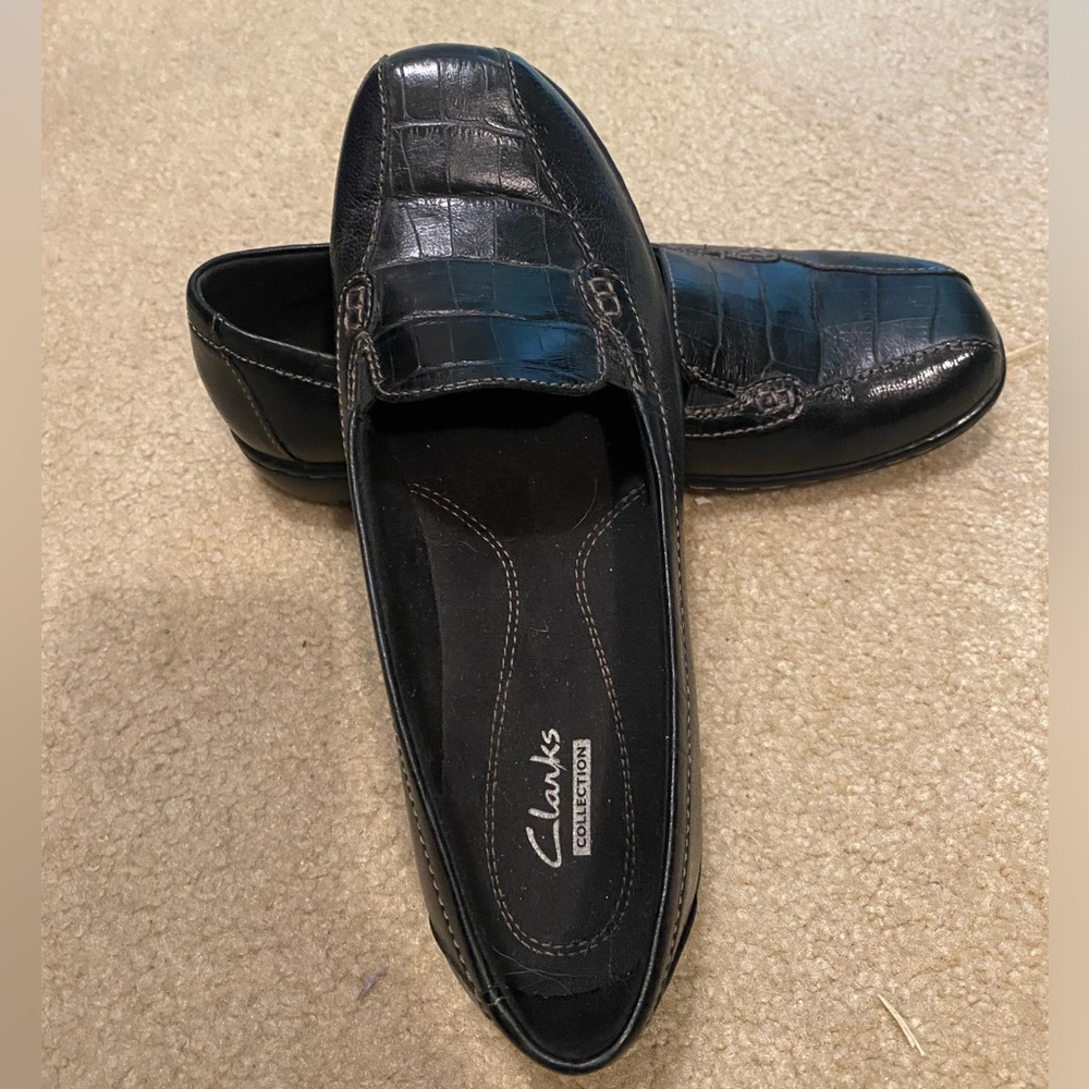 Clarks black flats. Worn one time. Smoke free home.